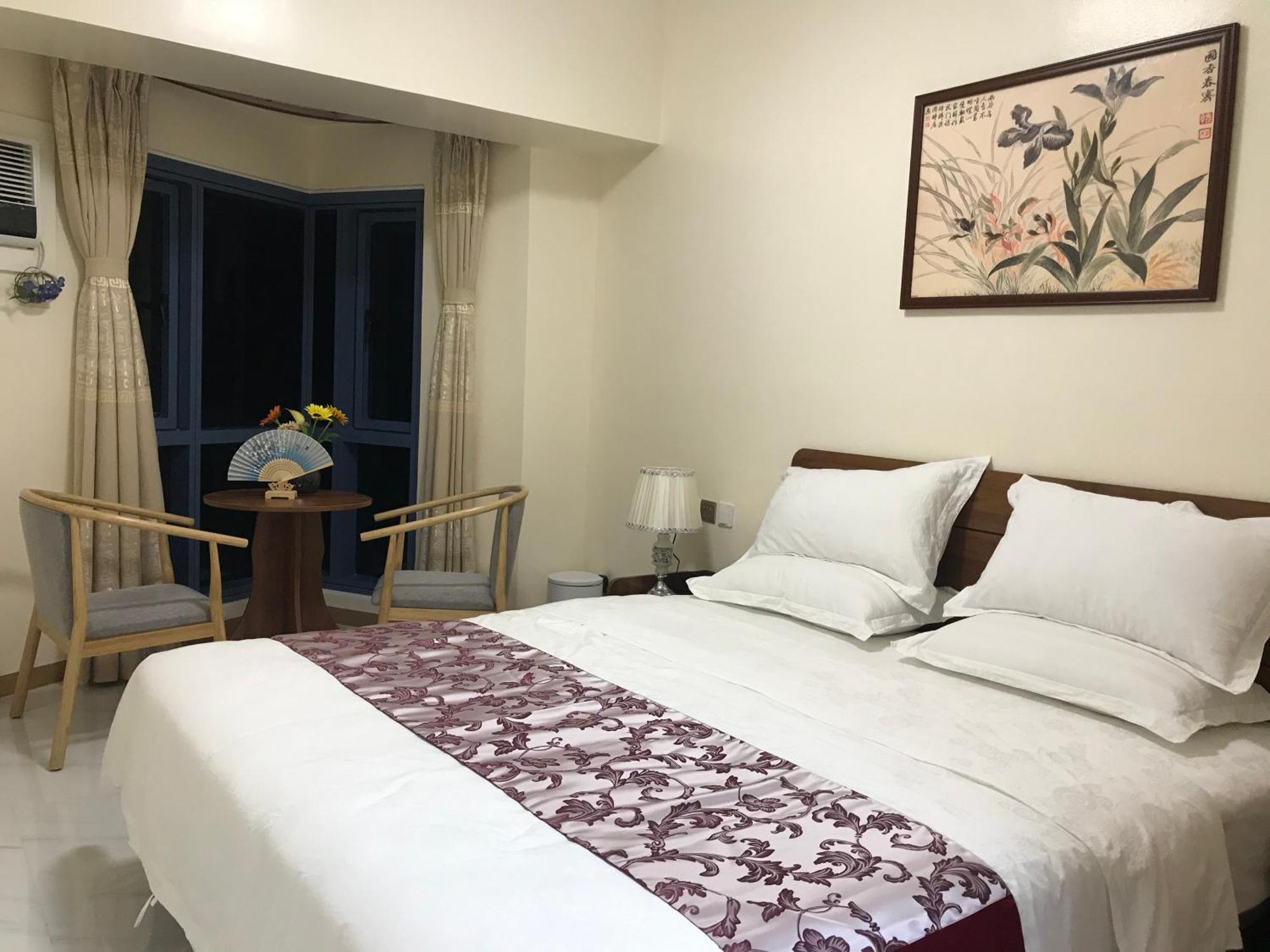 Sunset House Roxas Bay Apartment มะนิลา ภายนอก รูปภาพ