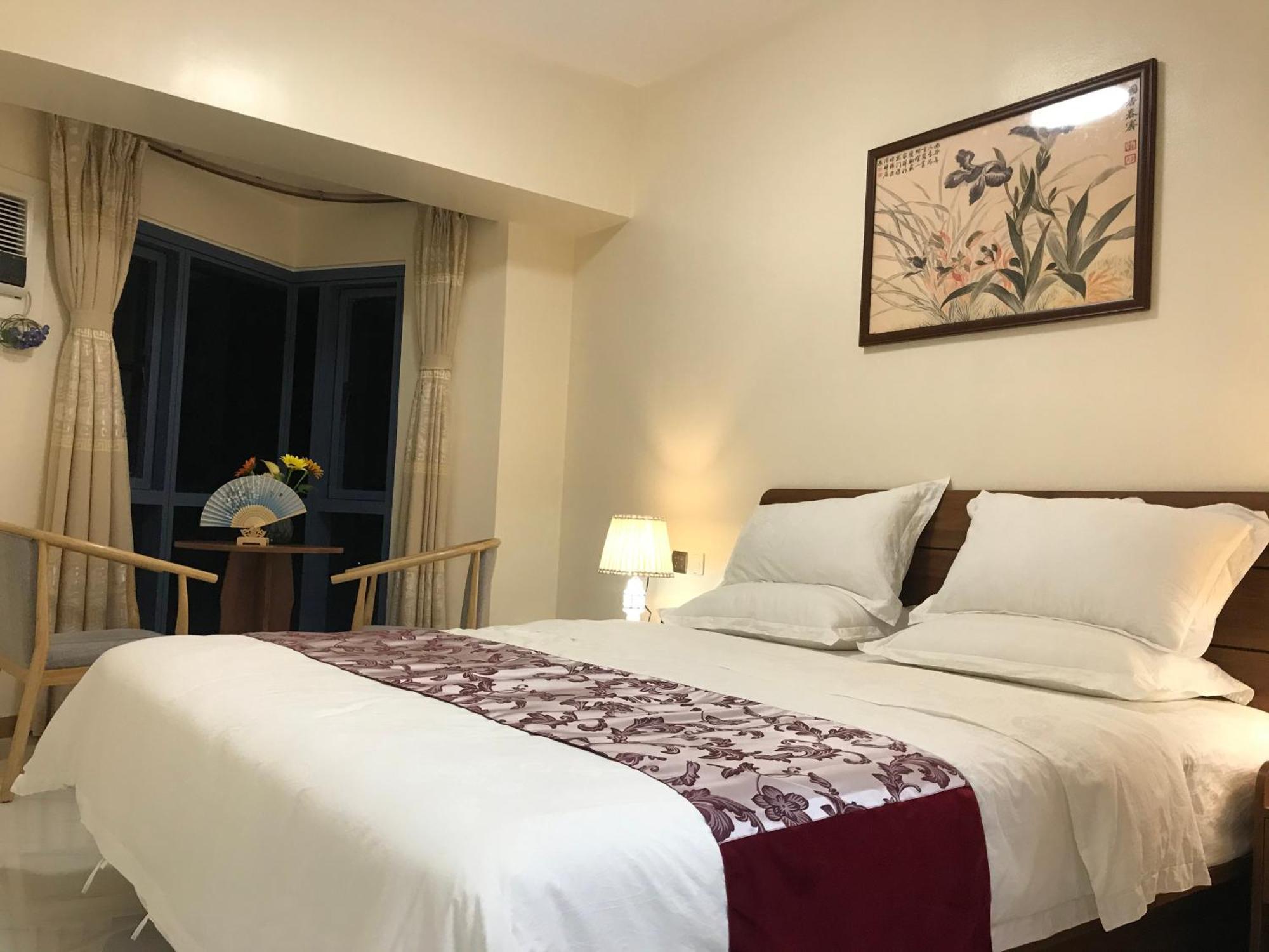 Sunset House Roxas Bay Apartment มะนิลา ภายนอก รูปภาพ