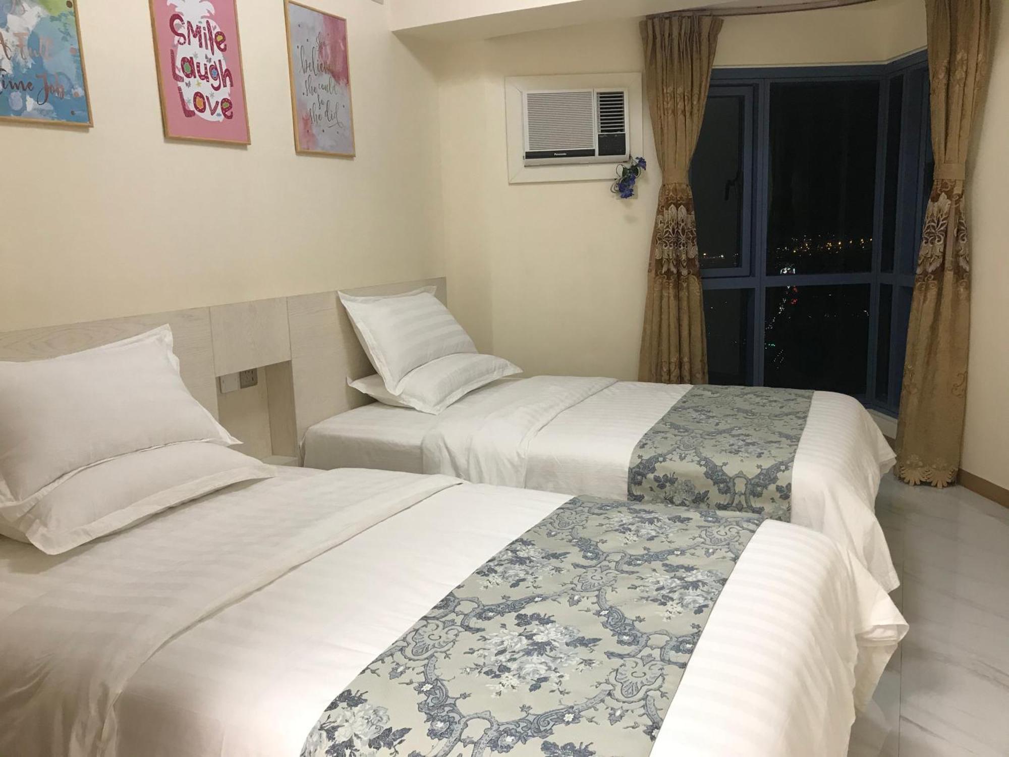 Sunset House Roxas Bay Apartment มะนิลา ภายนอก รูปภาพ