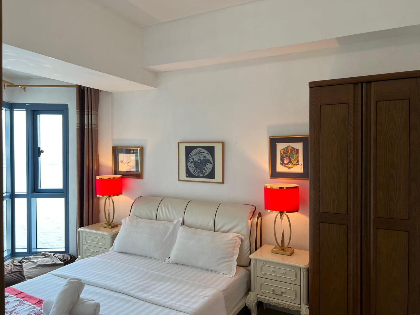 Sunset House Roxas Bay Apartment มะนิลา ภายนอก รูปภาพ