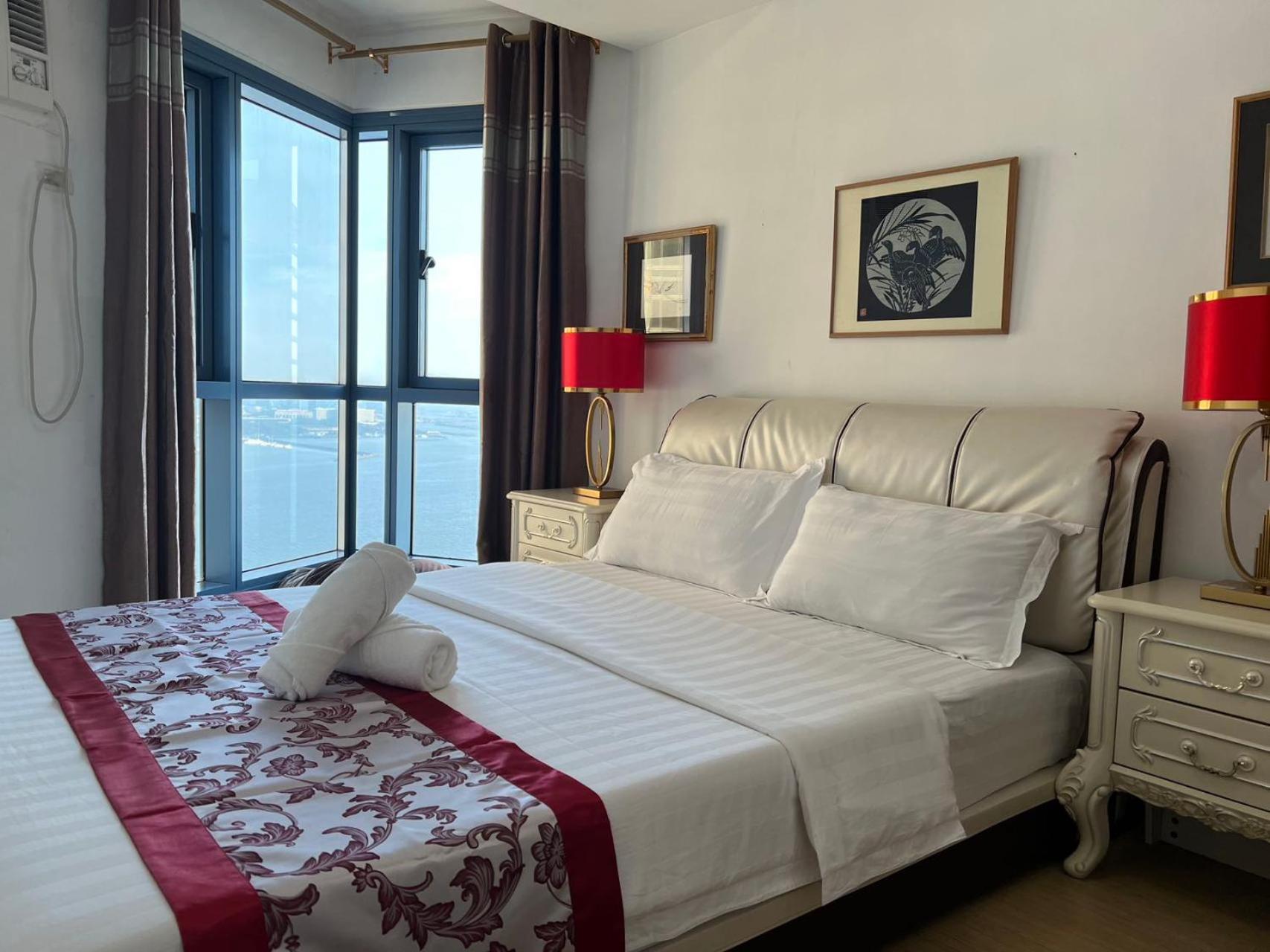 Sunset House Roxas Bay Apartment มะนิลา ภายนอก รูปภาพ