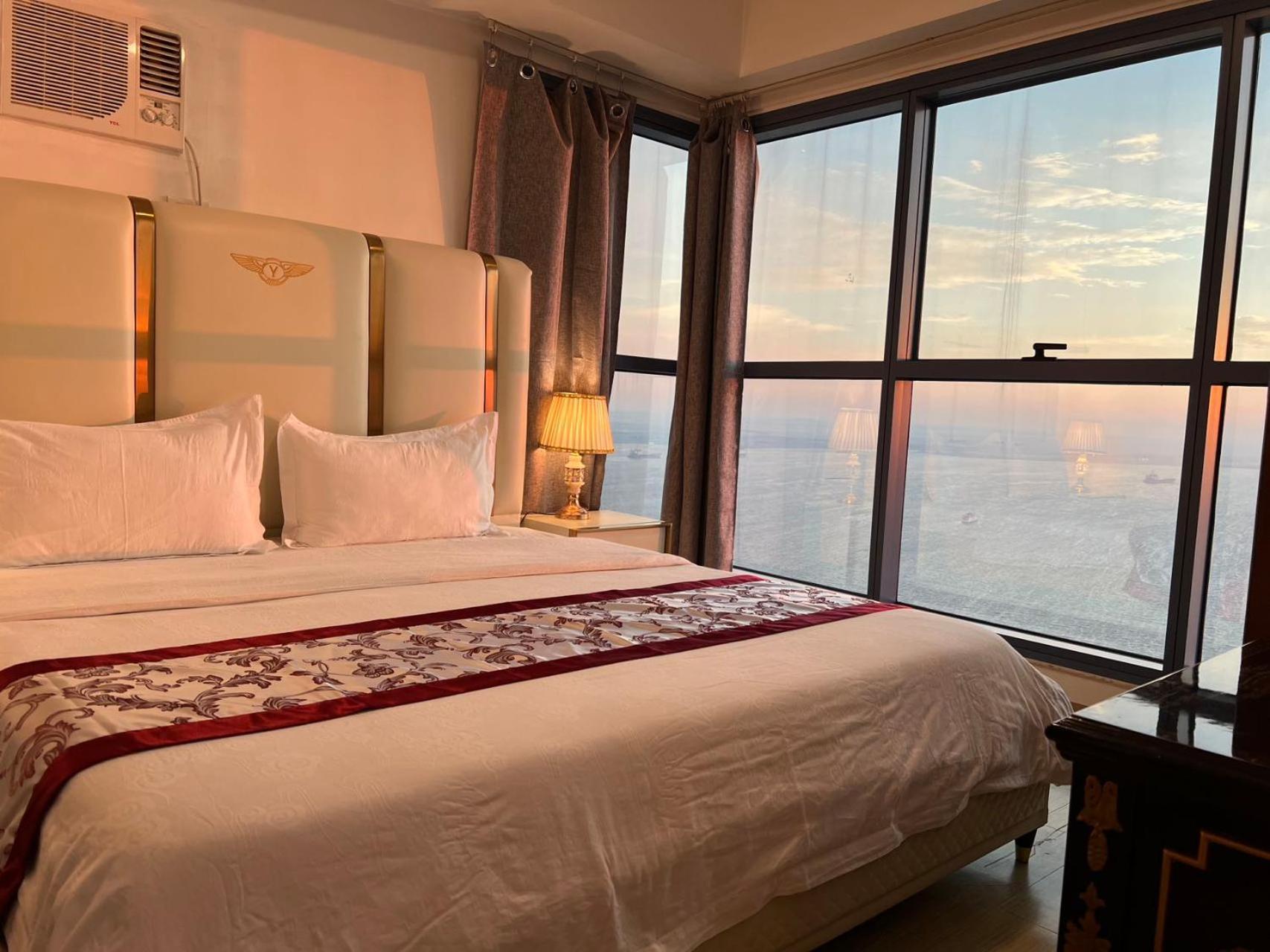 Sunset House Roxas Bay Apartment มะนิลา ภายนอก รูปภาพ