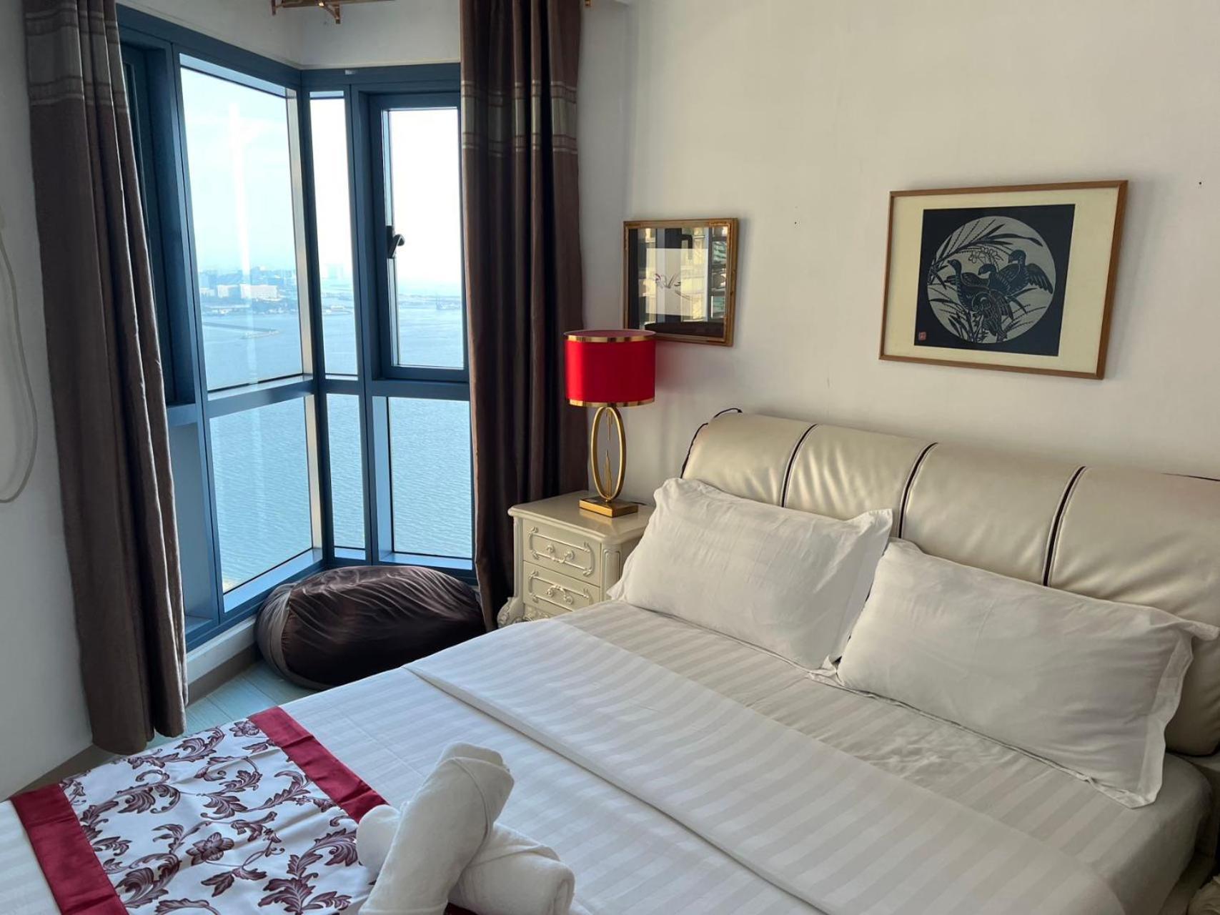 Sunset House Roxas Bay Apartment มะนิลา ภายนอก รูปภาพ