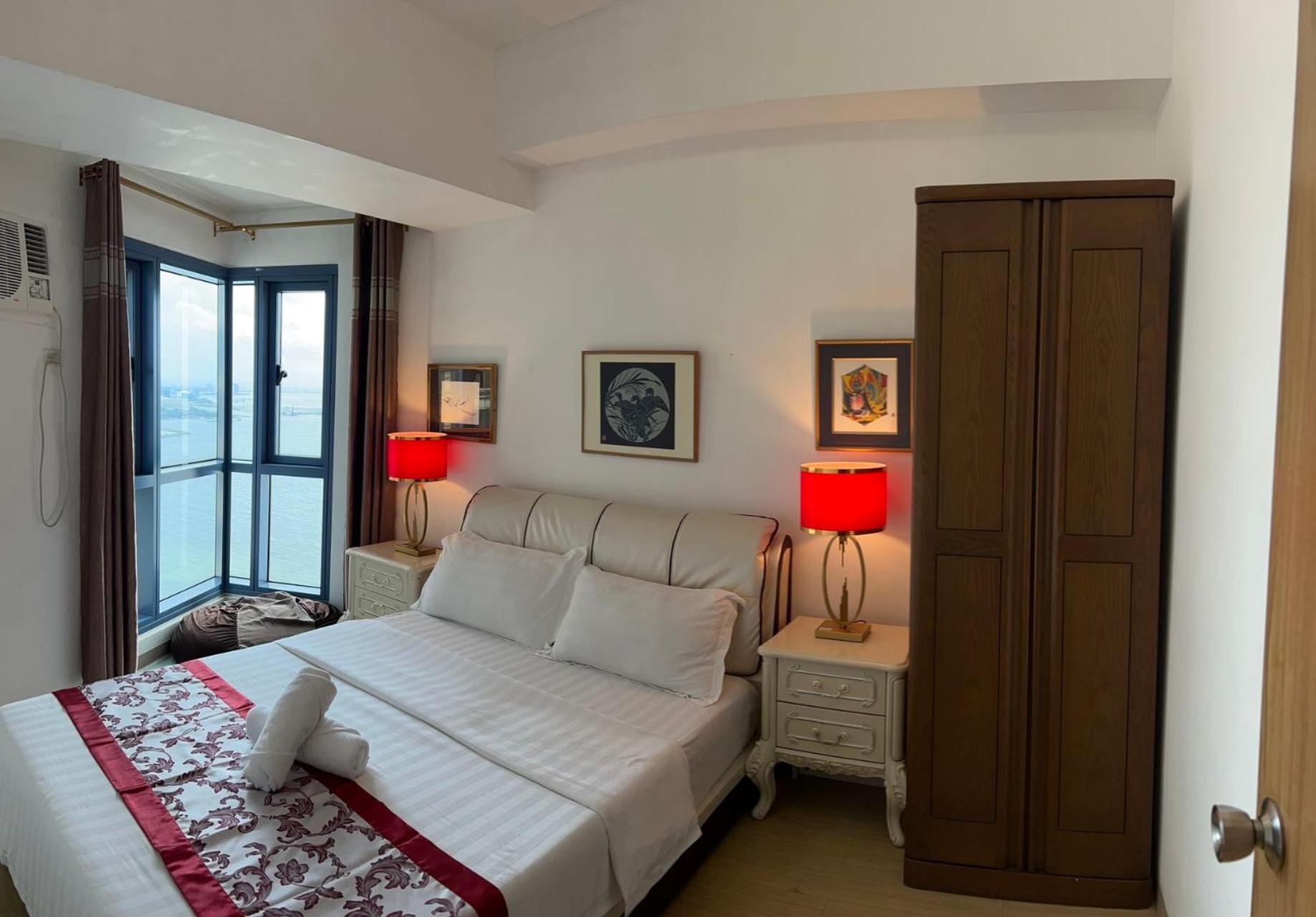 Sunset House Roxas Bay Apartment มะนิลา ภายนอก รูปภาพ