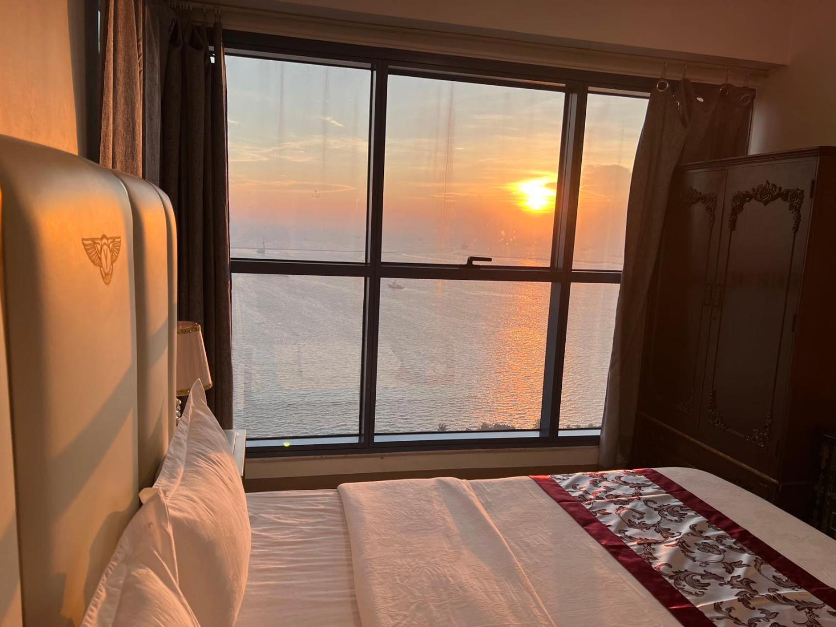 Sunset House Roxas Bay Apartment มะนิลา ภายนอก รูปภาพ