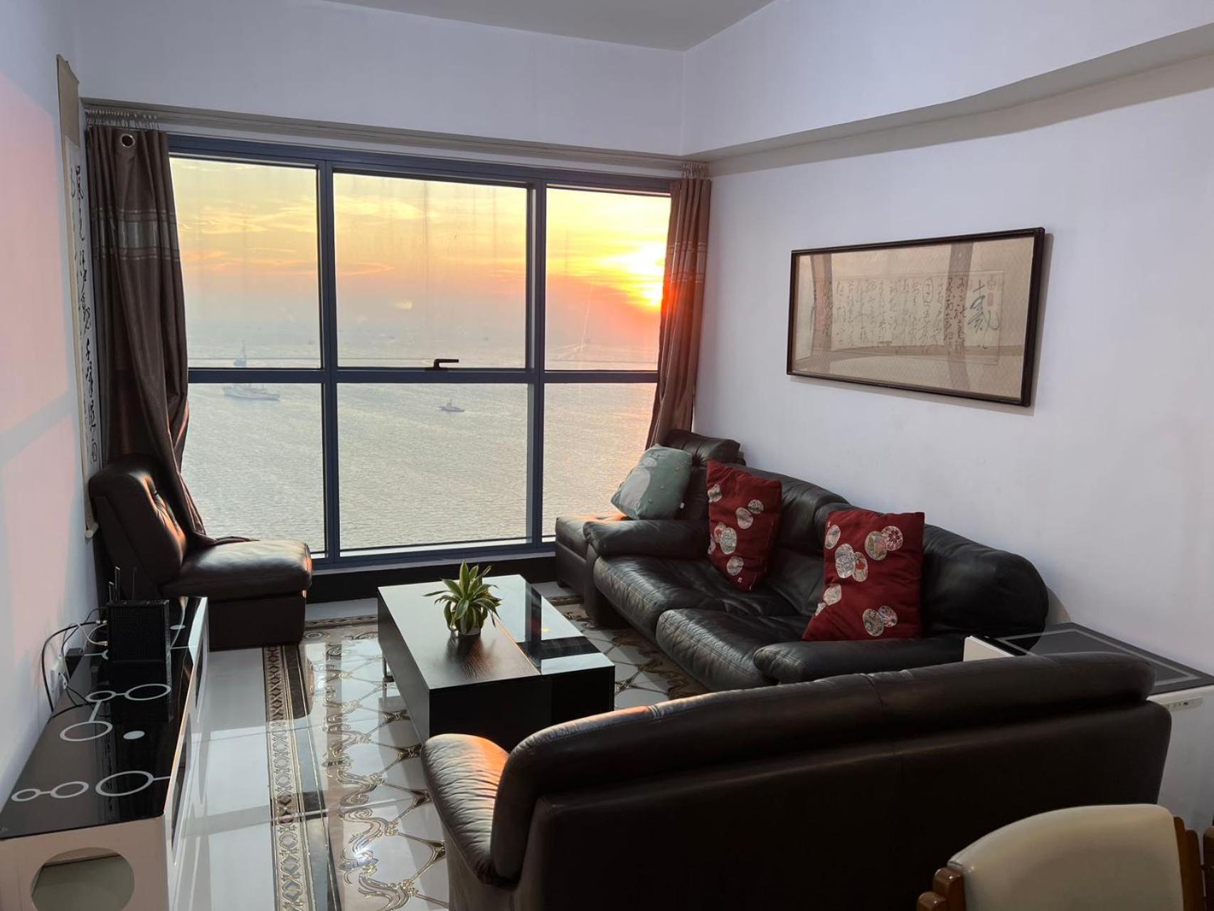 Sunset House Roxas Bay Apartment มะนิลา ภายนอก รูปภาพ