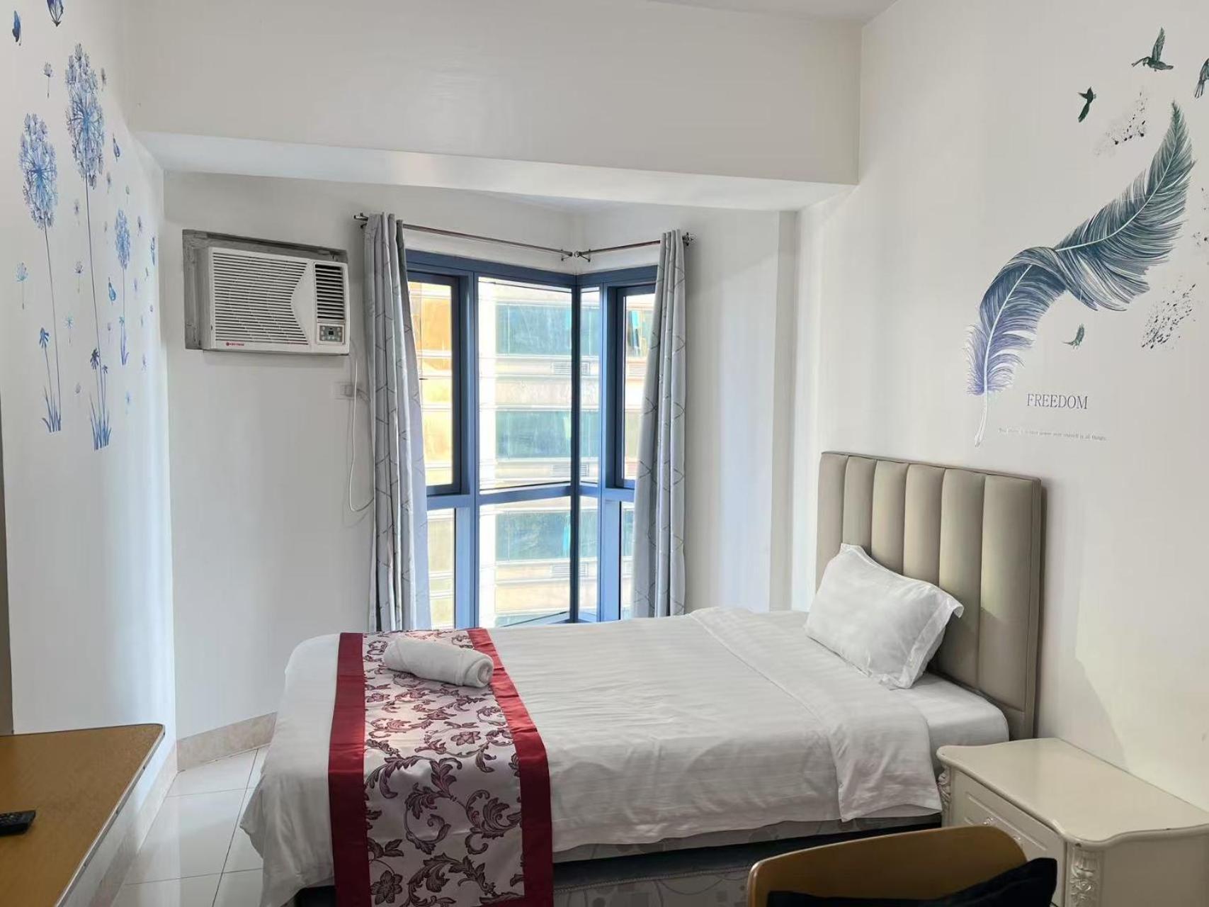 Sunset House Roxas Bay Apartment มะนิลา ภายนอก รูปภาพ