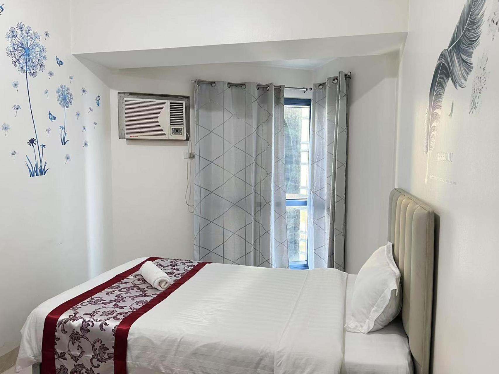 Sunset House Roxas Bay Apartment มะนิลา ภายนอก รูปภาพ